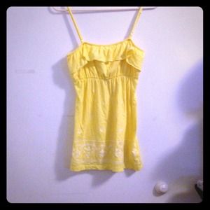 Bright yellow top with spaghetti strap