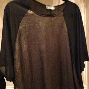 Slouchy and comfy gold and black top