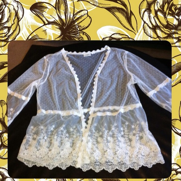 White sheer lace jacket or overlay
