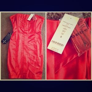 I'm selling a brand new Bebe dress, never worn.