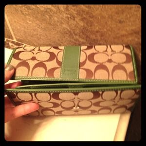 Green / brown Coach wallet with check book