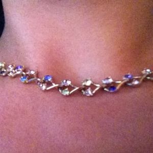 gold necklace with multi-color gems