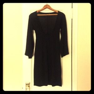Short black thin sweater dress. Peasant neckline.