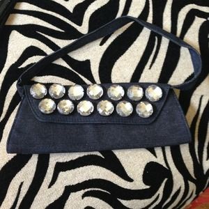 Jean material with big rhinestone detail