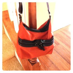 Nine and Co burnt orange handbag.