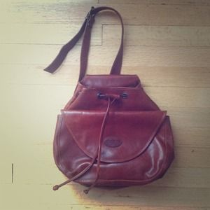 Vintage leather sling backpack