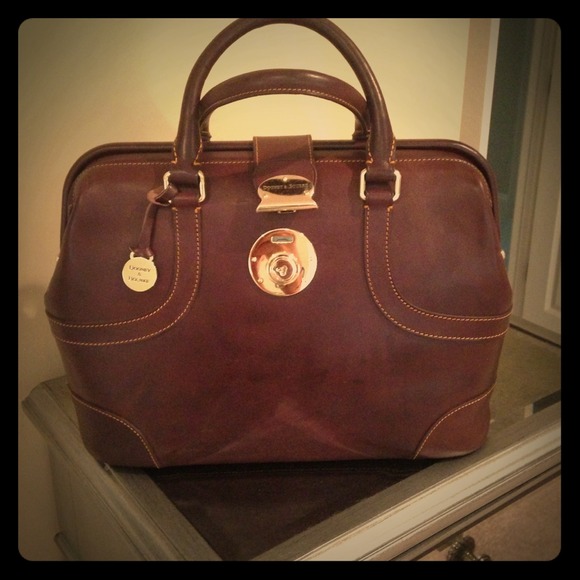 Dooney & Bourke never used doctor satchel purse!