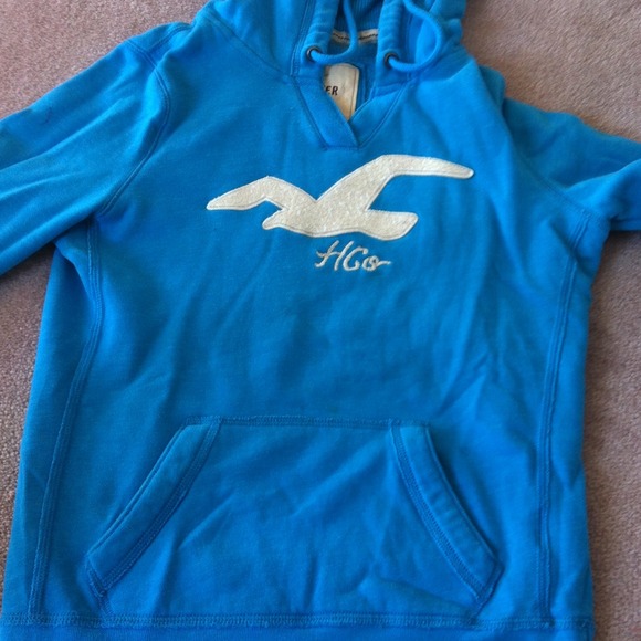size medium, blue sequined hollister sweatshirt