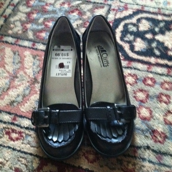 Black buckle heels