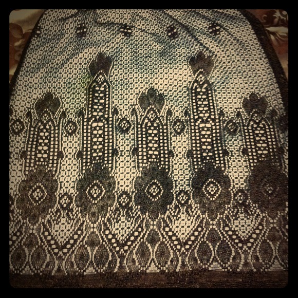 Cute lace/ fringe black and baby blue skirt.