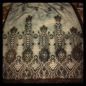 Cute lace/ fringe black and baby blue skirt.