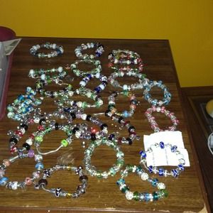 23 Pandora look alike glass bead bracelets.