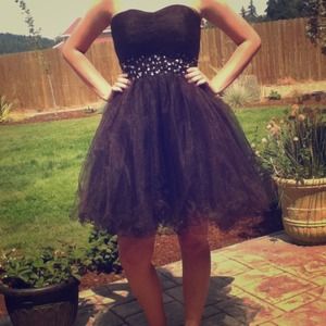 Black formal homecoming or prom dress.
