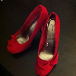 Red bowed and sueded Stilettos