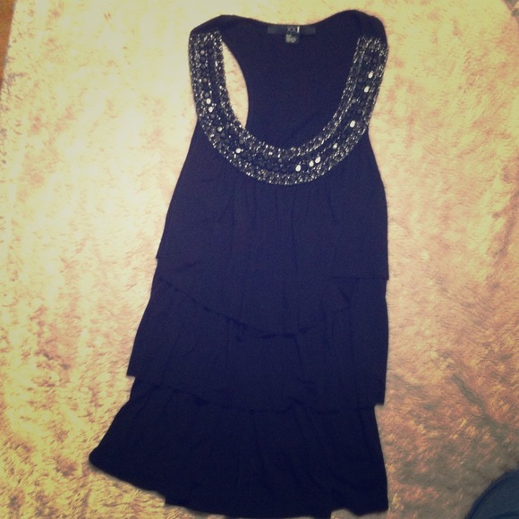 black top with medium black stones on top
