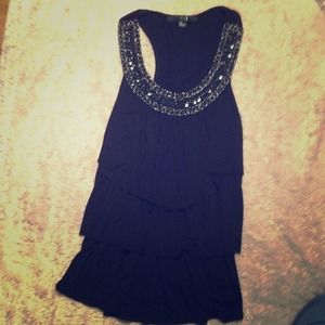 black top with medium black stones on top