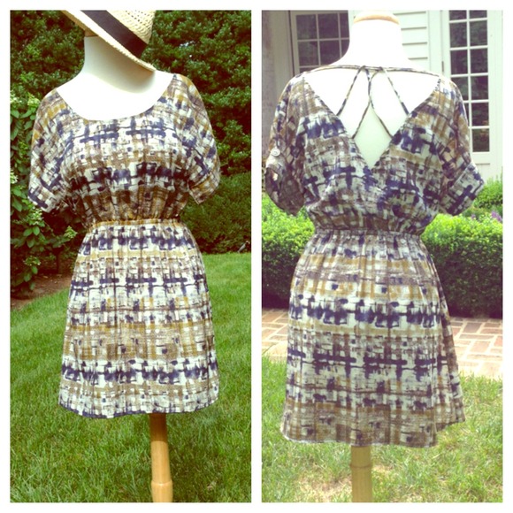 Fun printed dress with open back detail.