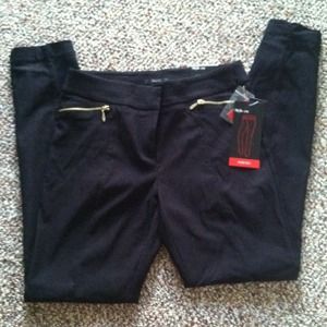 Black skinny dress pants.