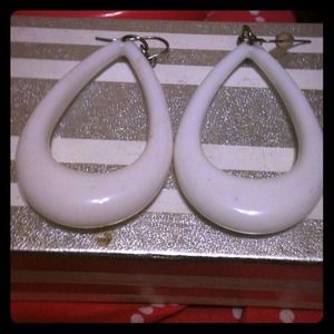 White dangling earrings.