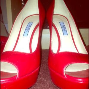 Red Prada Peep-toe pumps