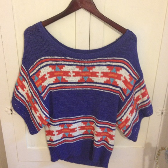 Knit poncho-like sweater