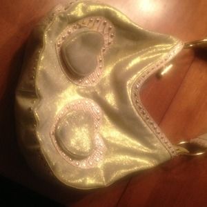 A "babeed leather purse with a lot of textures!