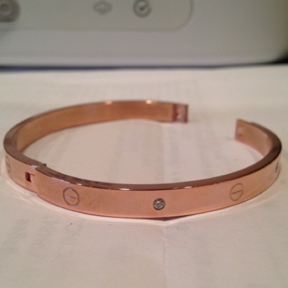 Jewelry - One rose gold tone stainless steel bangle