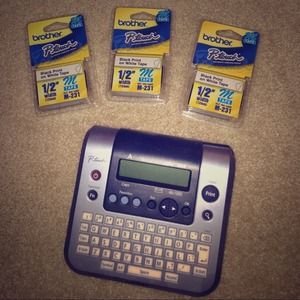 Brother label printer + 3 packs of printing tape