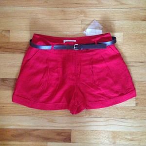 Red high waisted shorts with belt
