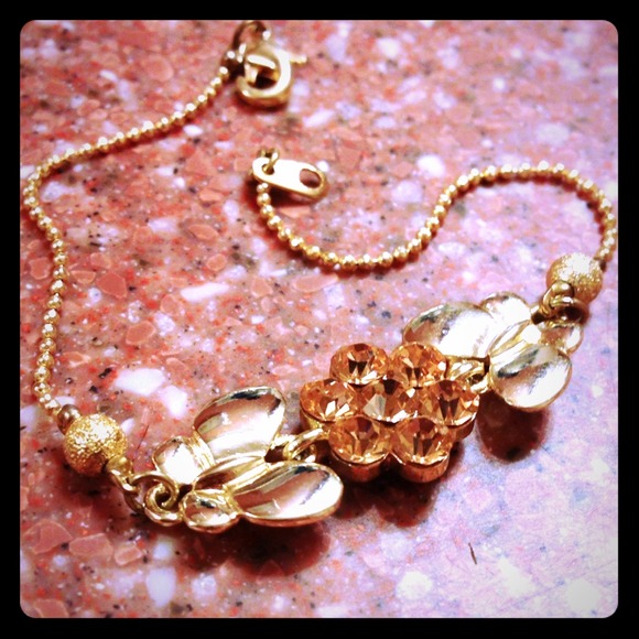 Butterfly and flower gem bracelet