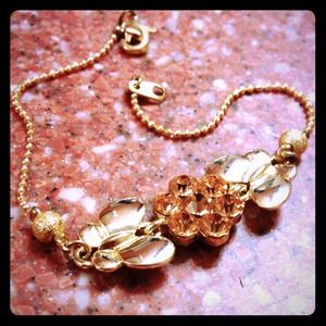 Butterfly and flower gem bracelet