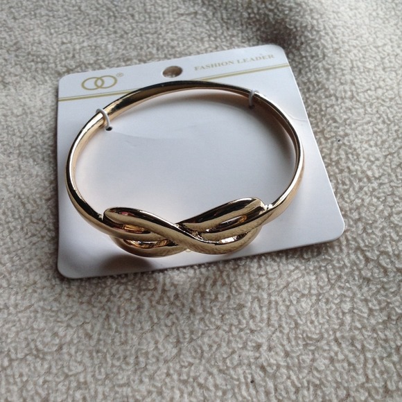 Gold infinity bangle - Picture 2 of 3
