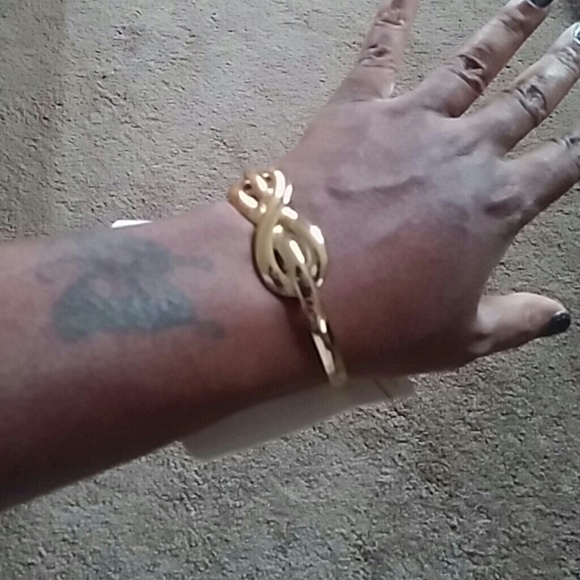 Gold infinity bangle - Picture 3 of 3