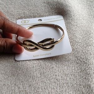 Gold infinity bangle