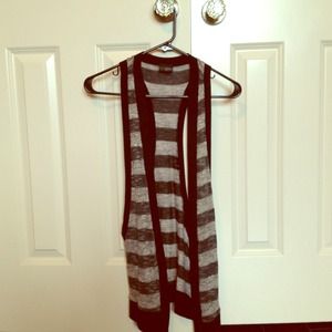 Black, grey, and gold sleeveless cardigan