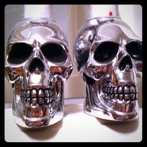 Skull taper candle holder.