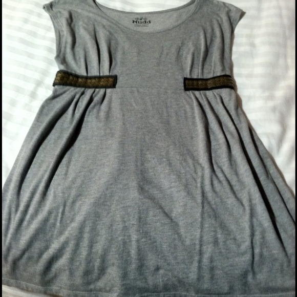 Loose fitting grey top.