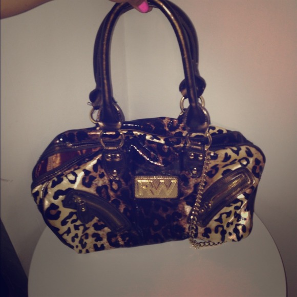 SOLD!!!🚫Cheetah Rocawear purse !!