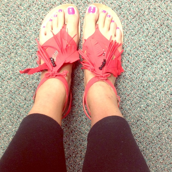 Red feathered sandals