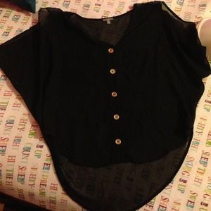 Super cute xs shirt! Fits xs-m!