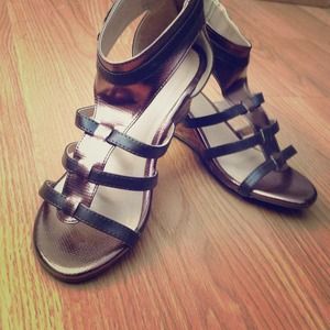 Brand new zip back heel metallic gladiators