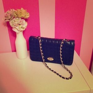 Black quilted clutch/handbag.