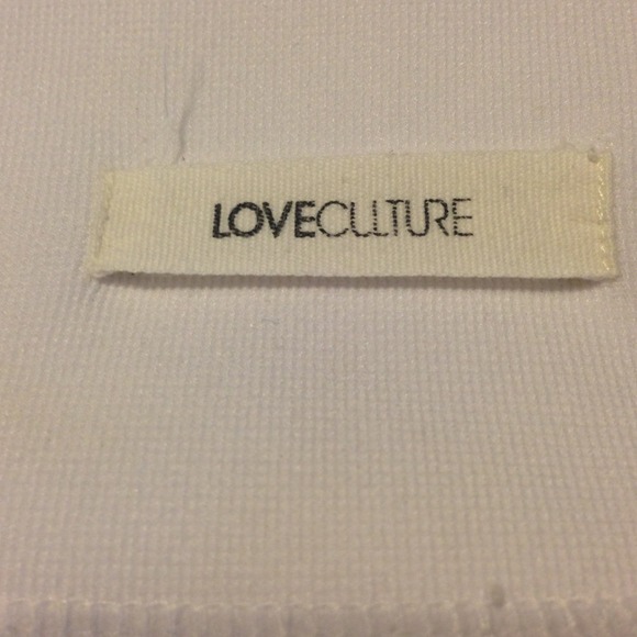 A white tube skirt. - Picture 2 of 4