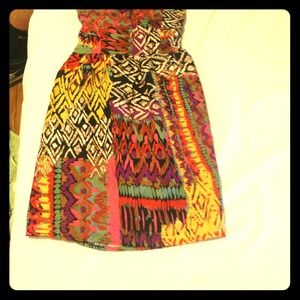 A cute strapless sun dress.