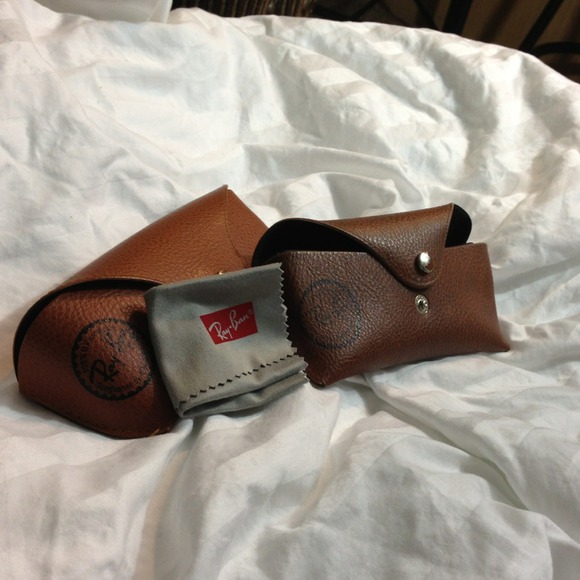Two used Ray Bans glasses holders