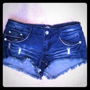 Destroyed denim shorts