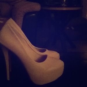 High heel beige red sole.