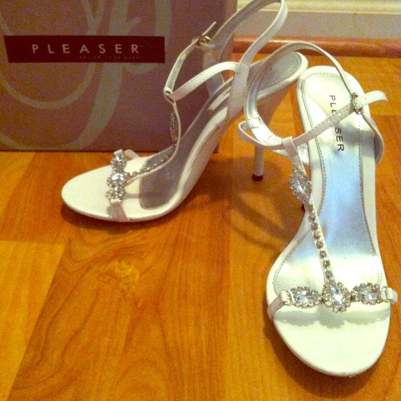White Heels with crystal gems down the middle.