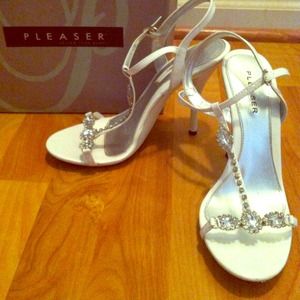 White Heels with crystal gems down the middle.