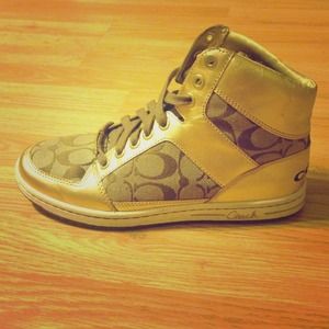 High top authentic gold coach sneakers